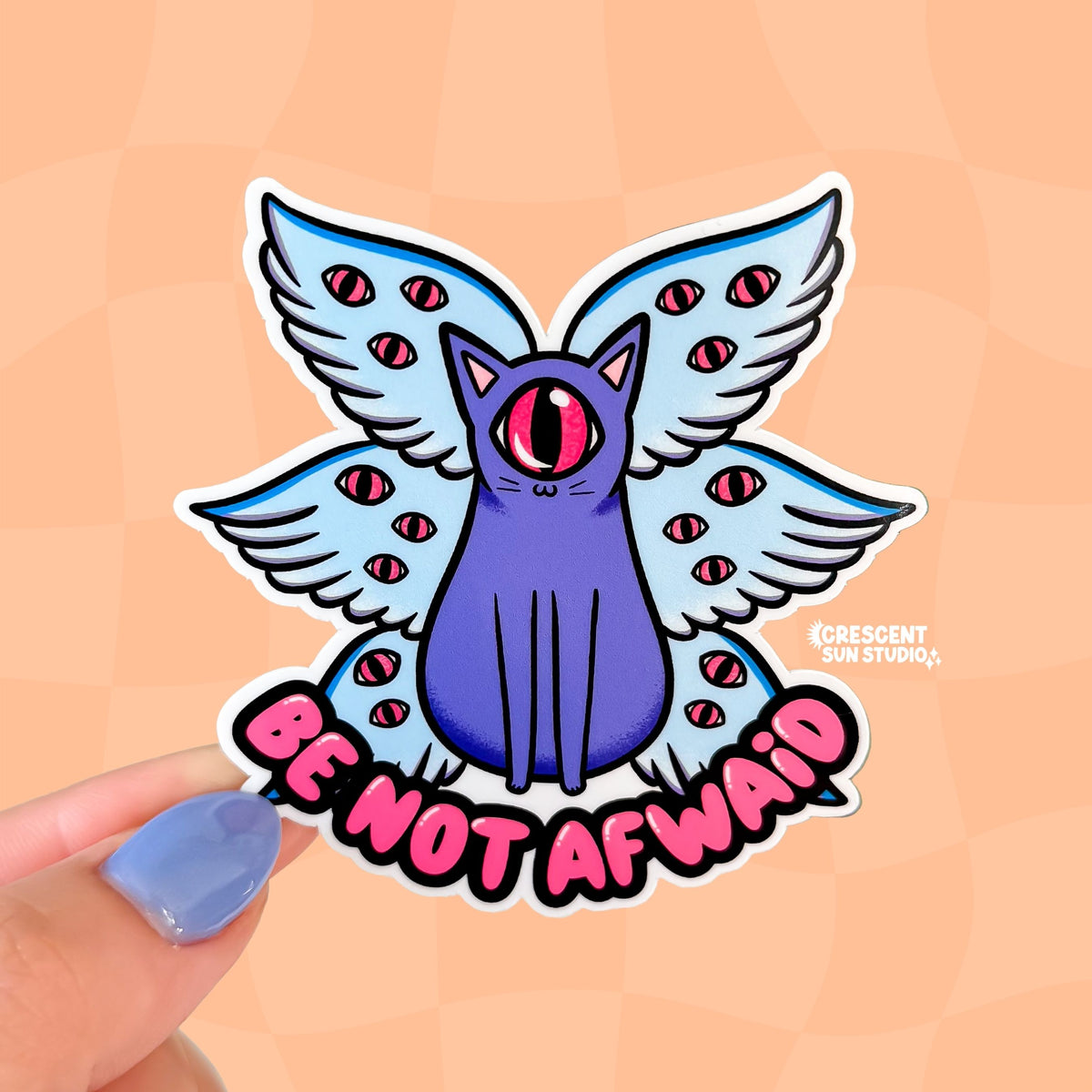 A purple cat with one large pink eye at the center of its face stoically observes you. The cat has three pairs of light-colored angel wings, each wing covered with watchful pink eyes. Underneath the cat, there is pink bubble text that reads: Be Not Afwaid.
