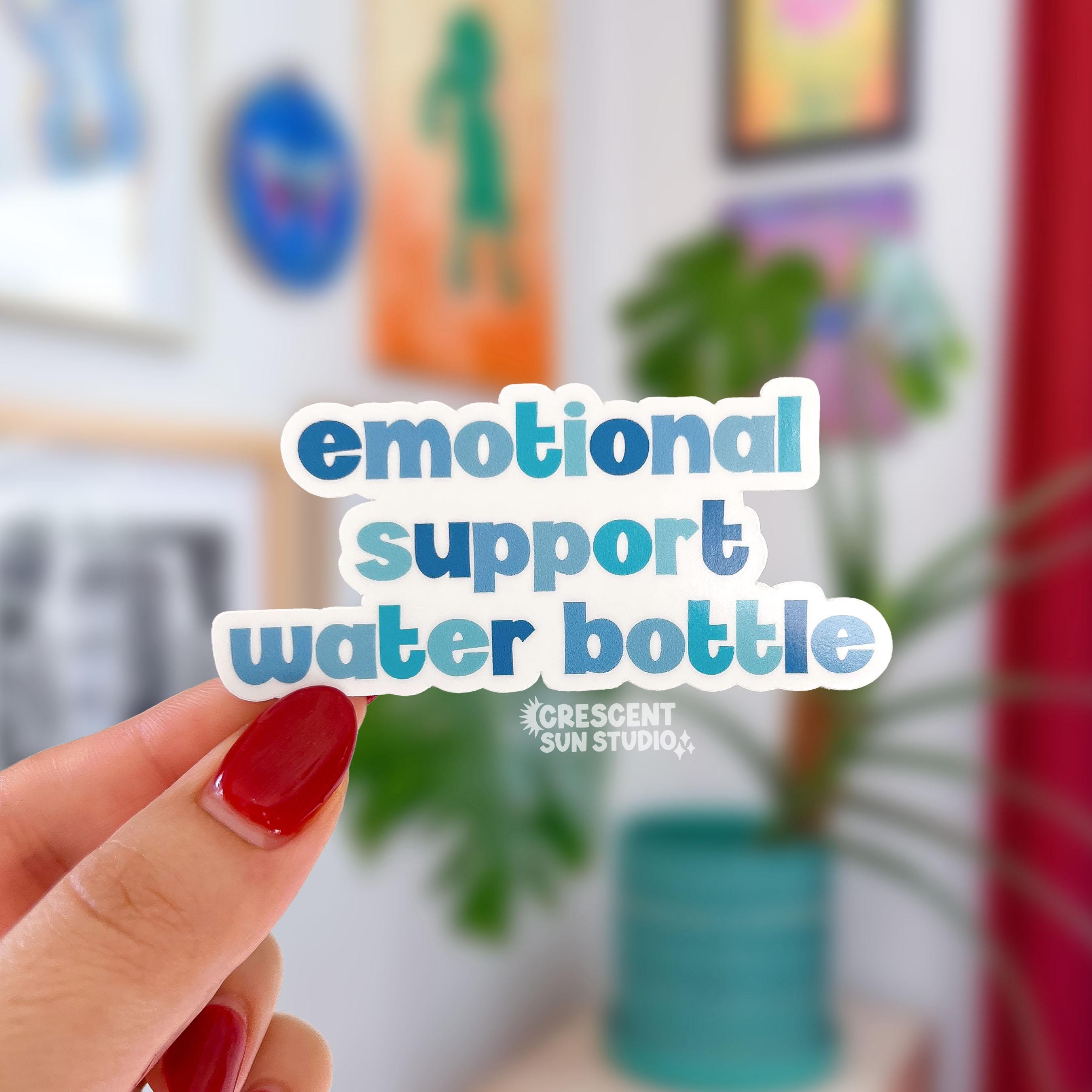 In shades of blue, this die cut sticker reads "emotional support water bottle" on three lines.
