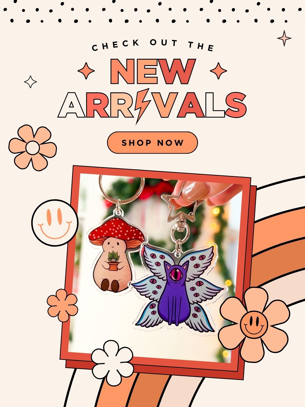 Banner reads "check out the new arrivals, shop now." The "i" in "arrivals" is a lightning bolt. the colors of the banner are shades of orange and cream. There are doodles of flowers and smiley faces on the banner, as well as images of keychains.