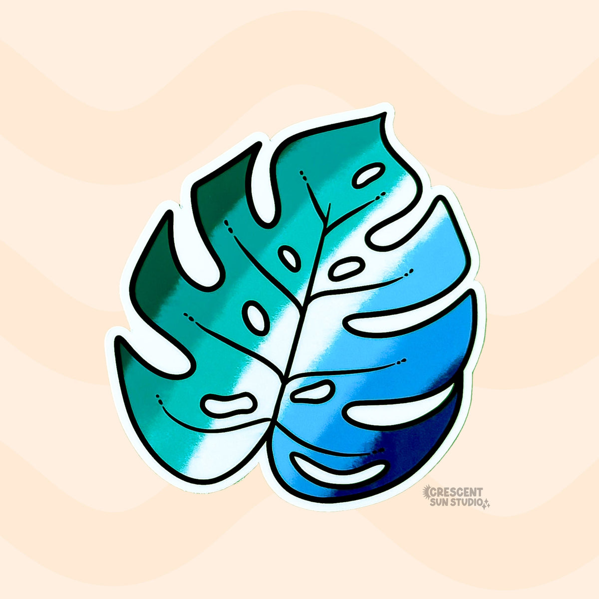 This monstera leaf sticker depicts the gay flag, with shades of dark green, teal, white, and blue.