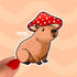 A sticker in the shape of a sitting capybara wearing a mushroom cap on his head. The capybara is brown and has a happy expression on his face. His cap is red with white spots.
