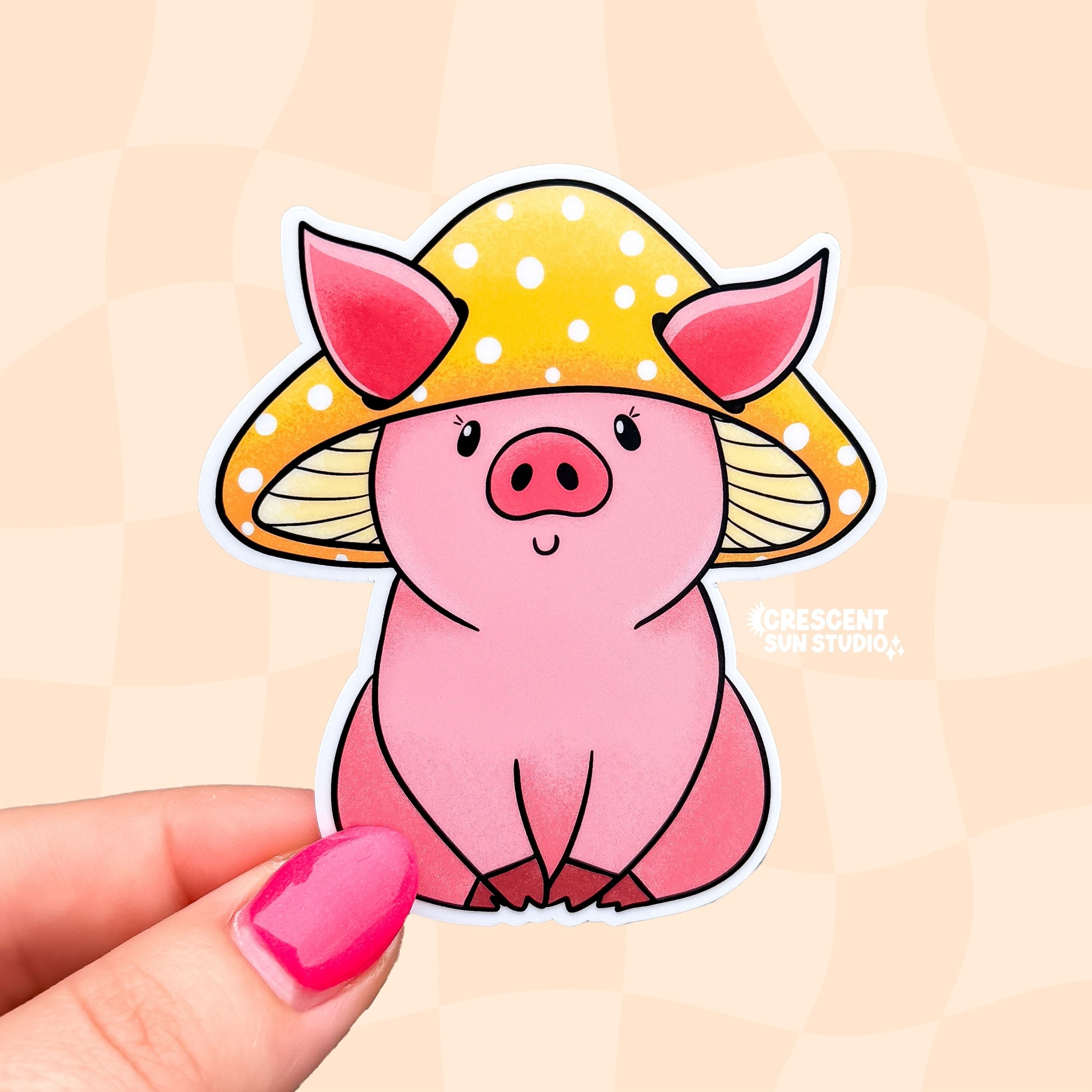 A sticker in the shape of a sitting pig wearing a mushroom hat. This pink shaded pig happily wears a yellow mushroom with white spots as a hat. His large pig ears stick out of the mushroom.