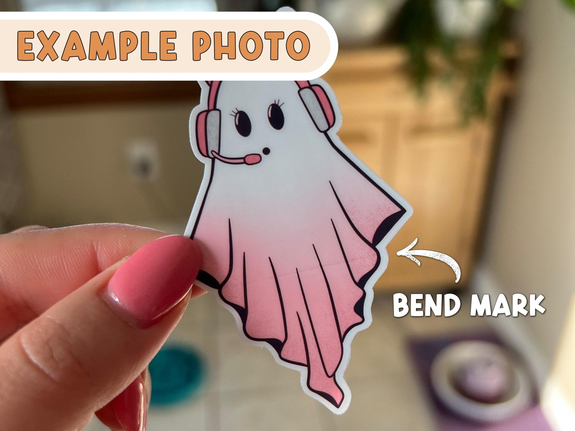 Image shows a die cut ghost sticker with a bend mark as a flaw.