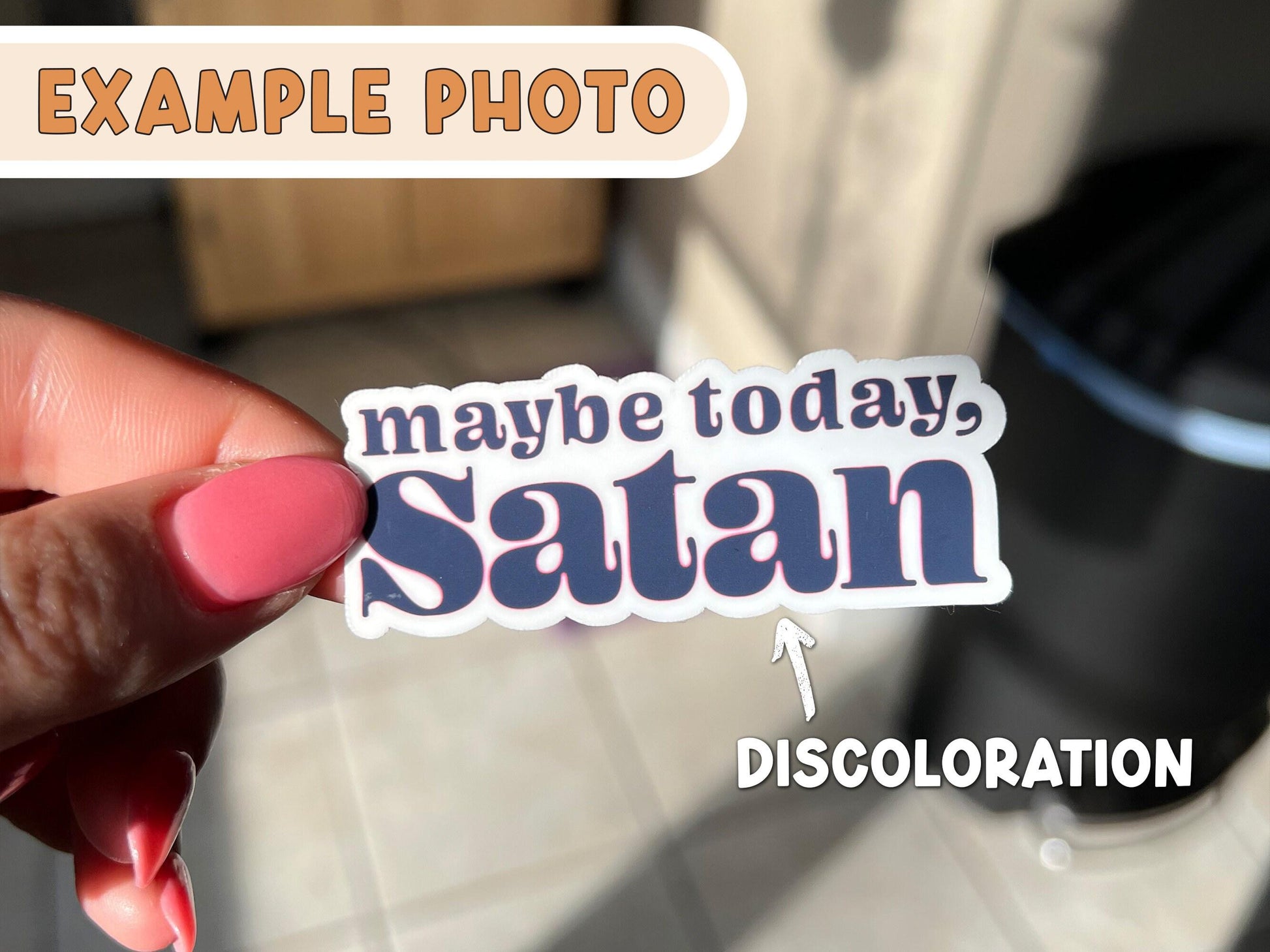 Image shows a "maybe today, Satan" sticker with discoloration