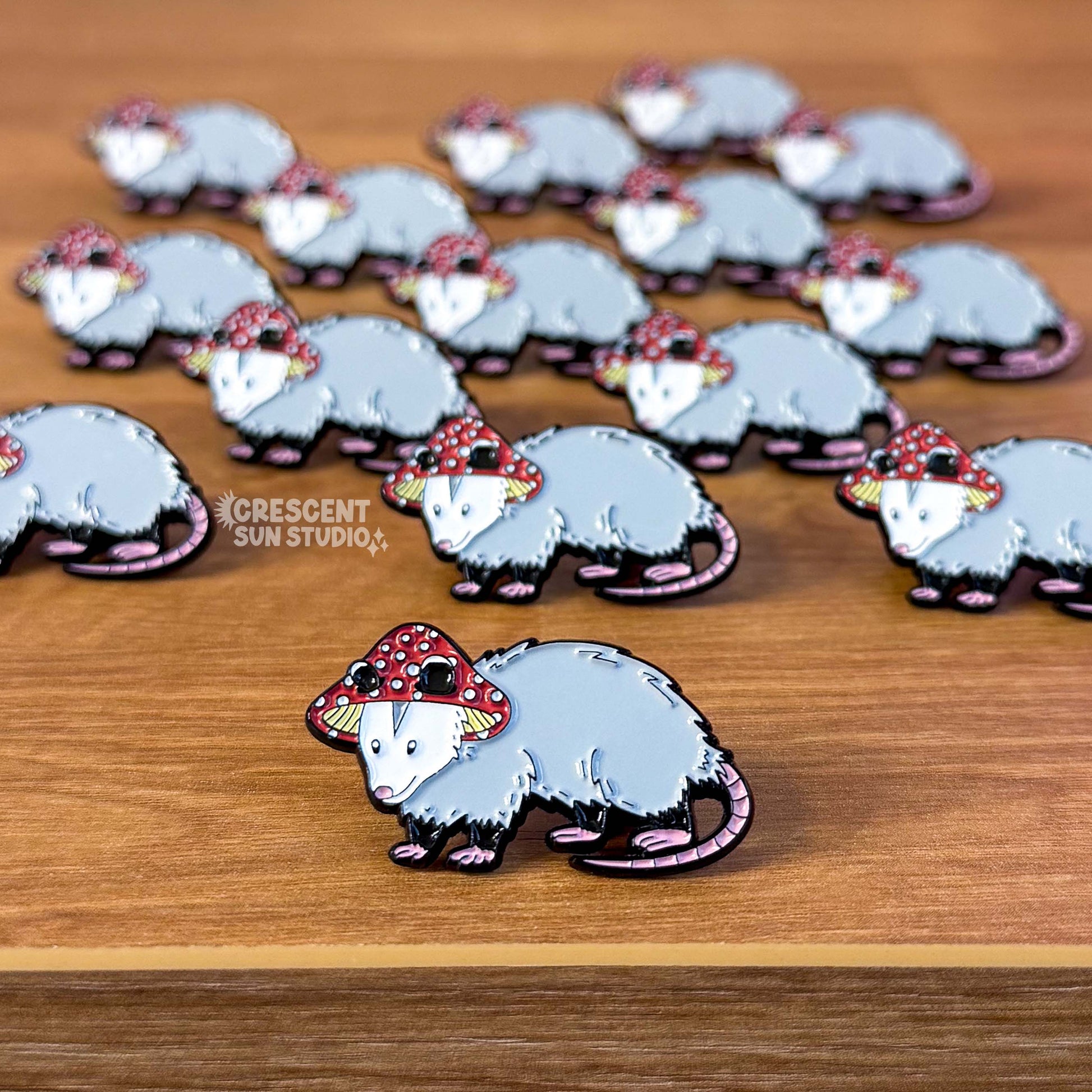 A group of opossum pins