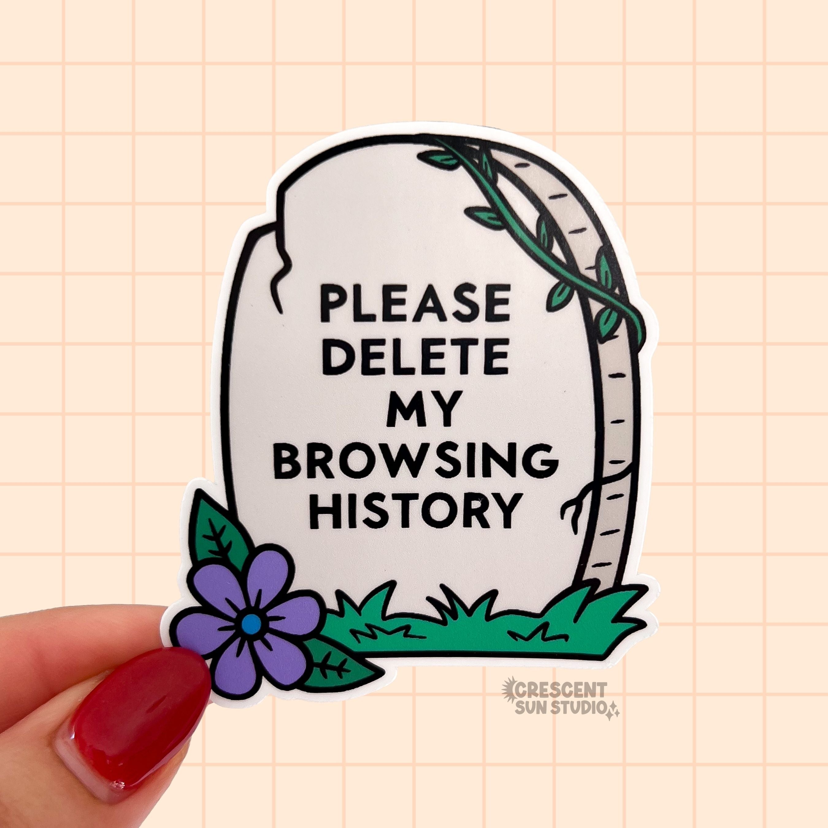 A light grey gravestone sticker with text that reads "please delete my browsing history" in black. 
