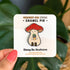 An enamel pin of a plump, smiling pinky-beige mushroom character with a red mushroom cap with white spots is holding a tiny potted plant in his little mushroom arms. The pin is displayed on a small card with the text "Crescent Sun Studio, enamel pin."